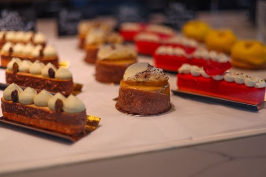 a bakery display with colorful cakes