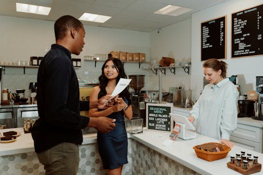 Image of a busy coffee shop with customers engaging